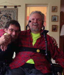 David Oaks, giving a hug to filmmaker Daniel Mackler one week ago......